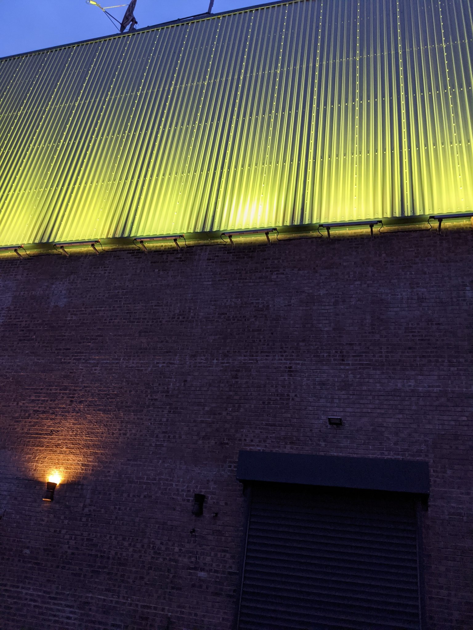 Torch Theatre, Milford Haven lit up for st john's day